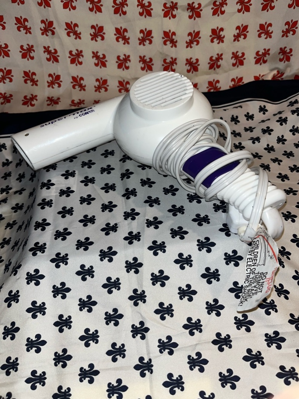 White Handheld Hair Dryer with Purple Accent
